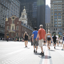 Visitors outside the Old State House along the Freedom Trail in Boston, Massachusetts