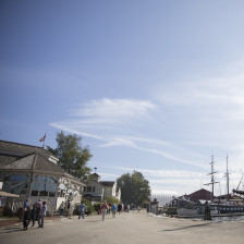 Visitors walking along the Mystic Seaport in Connecticut