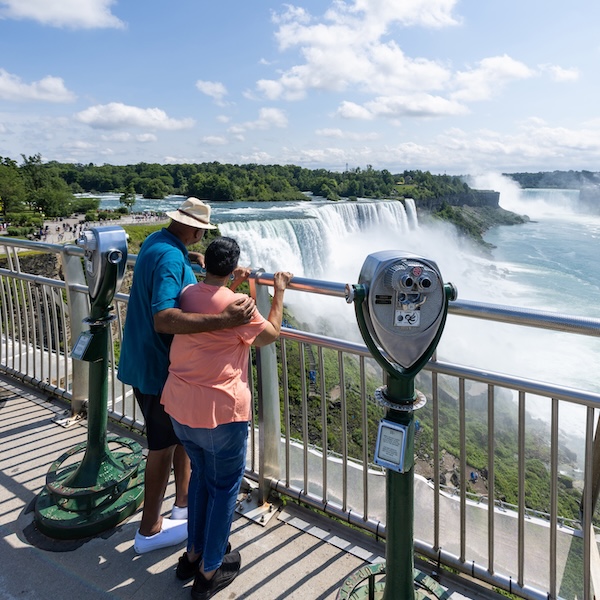 A couple overlooking the Niagara Falls in New York