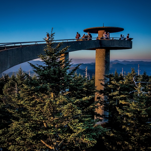 People enjoying the view from Clingmans Dome Observation Tower in Great Smoky Mountains National Park in Tennessee
