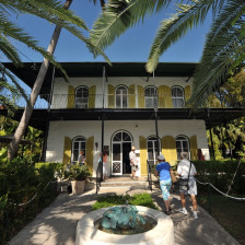 Visitors at the entance to Hemingway Home and Museum in Key West, Florida