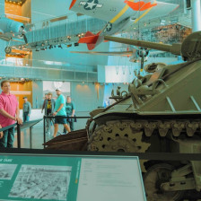 Visitors looking at exhibits in the National WWII Museum in New Orleans, Louisiana