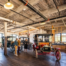 Visitors Inside the Ford Piquette Avenue Plan Museum in Detroit, Michigan