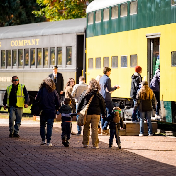 Visitors climbing aboard an exhibit at the National Railroad Museum in Green Bay, Wisconsin