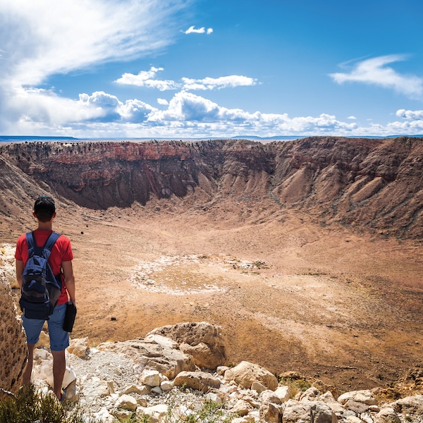 Man overlooking Meteor Crater in Winslow, Arizona