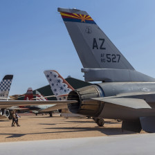 Visitors wandering the outdoor exhibits of the Pima Air and Space Museum in Tucson, Arizona